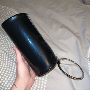 Kara holographic cylinder bracelet ring clutch wristlet